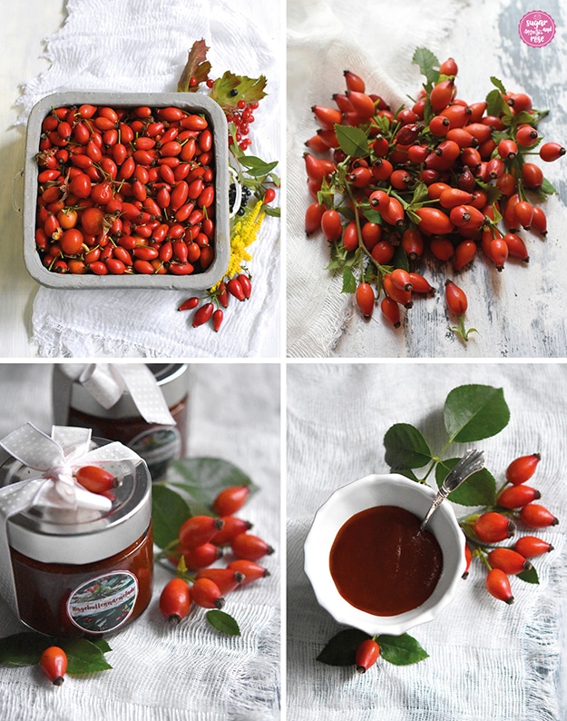 Frische Hagebutten in eckiger Schale und einmal lose auf weißem Holzbrett; darunter Hagebuttenmarmelade in Gläser gefüllt und eine kleine weiße Schale mit Hagebuttenmus und einem Silberlöffelchen